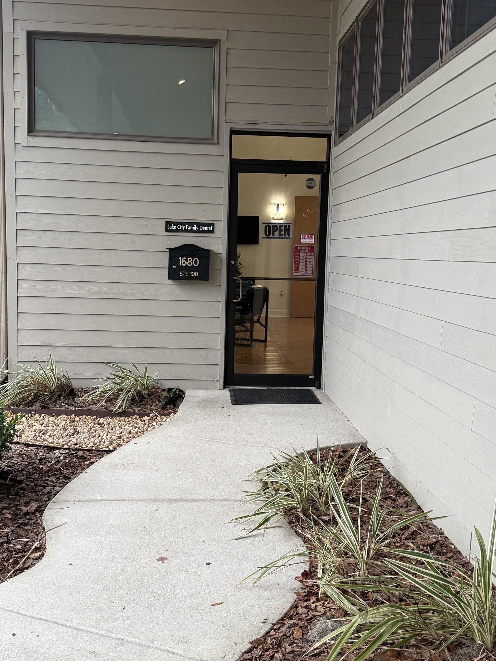 Front entrance Suite 100 with Lake City Family Dental sign