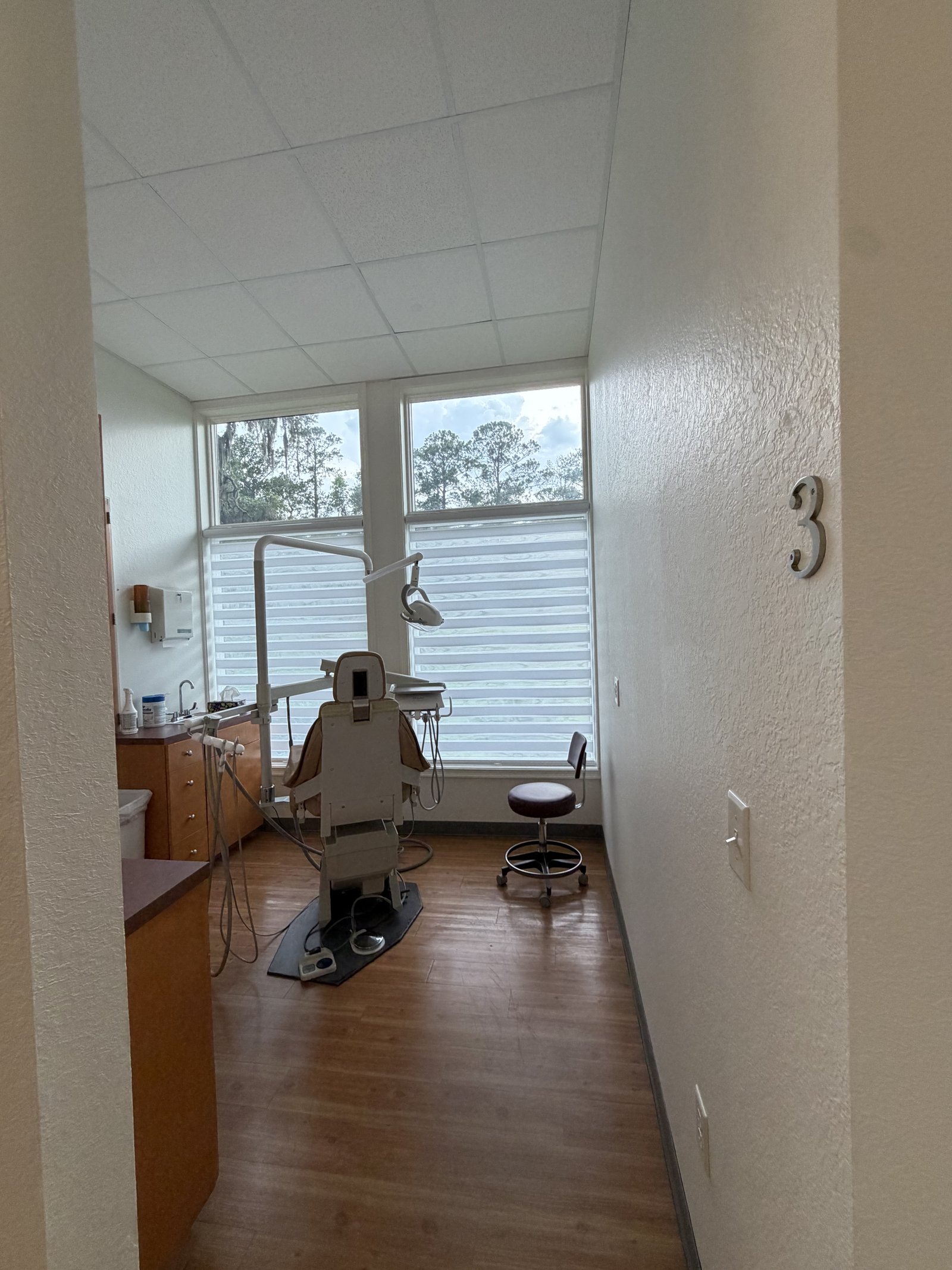 Treatment room with natural light and modern equipment
